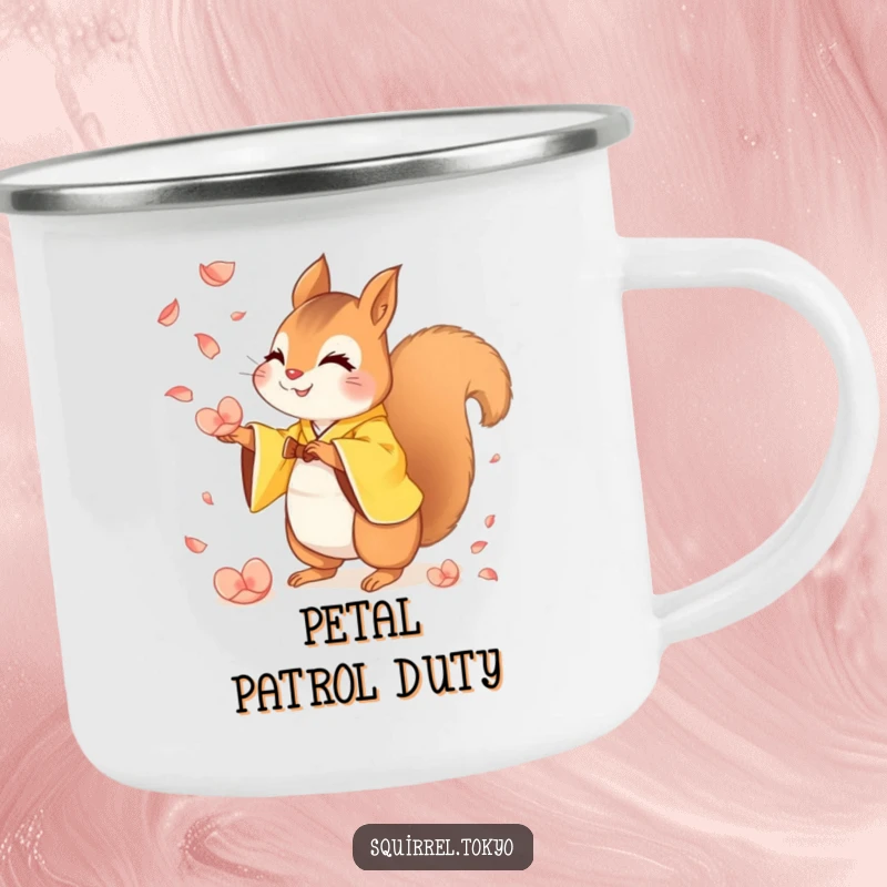 Funny camping mug with a mischievous squirrel in a yellow kimono catching falling petals, ideal for outdoor humor and hot drinks.