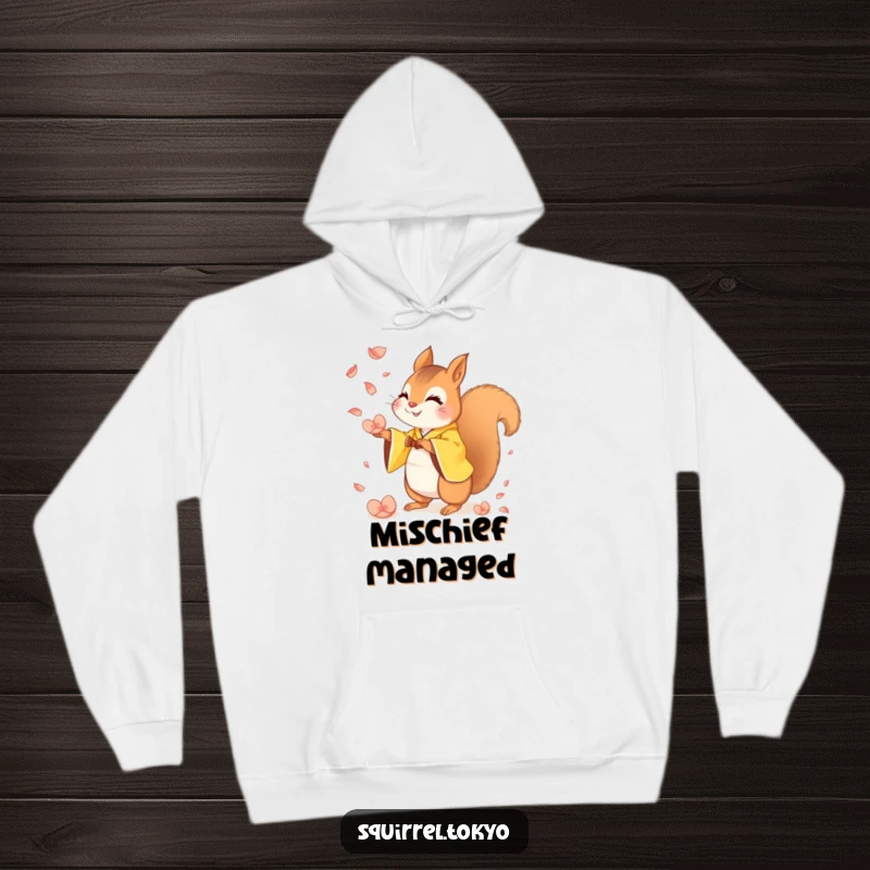 Funny hoodie featuring a mischievous squirrel in a yellow kimono catching falling petals, offering cozy comfort and impish humor.
