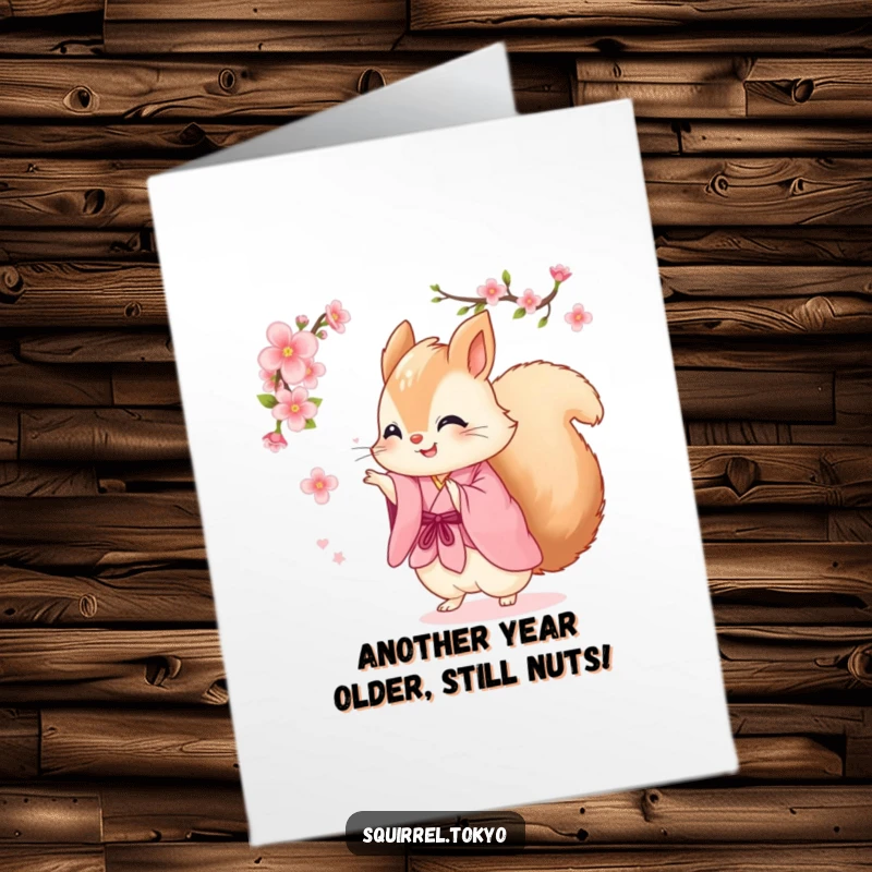 Funny Free Printable Birthday Card: Fluffy squirrel in pink kimono joyfully spinning with a cherry blossom, downloadable art.