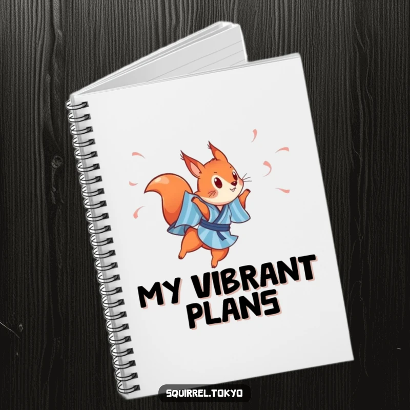 Funny notebook with a cover illustration of a playful red squirrel in a blue striped kimono, leaping with streamers, for energetic journaling.
