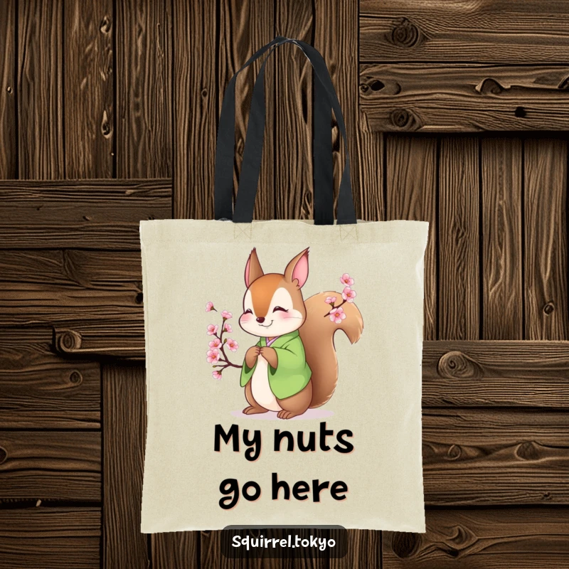 Funny tote bag showcasing a smiling squirrel in a green kimono bowing peacefully amidst blossoming branches, a humorous and practical accessory.
